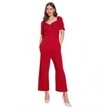 Red polyester lycra puff sleeve jumpsuit with zip closure, solid pattern