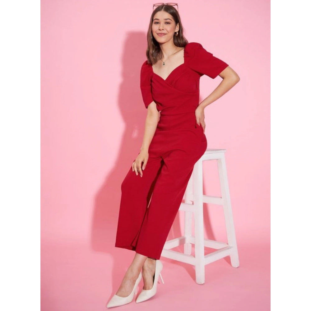Red polyester lycra women's jumpsuit with puff sleeves and zip closure on model