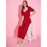 Red polyester lycra women's jumpsuit with puff sleeves and zip closure on model