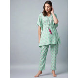 Green-Pink rayon floral kaftan night suit with V-neck and kaftan sleeves, ankle length, slip-on closure, pant bottom style on model