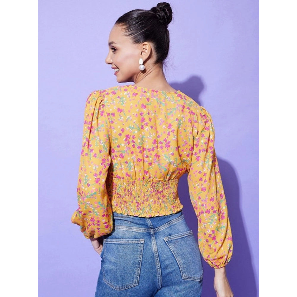 Multicolor polyester floral long sleeves top with V-neck and hip length, women's fashion on mannequin