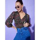 Multicolor polyester floral long-sleeved top with V-neck on women's mannequin