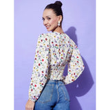 Women's multicolor polyester floral long sleeves V-neck top with hip length, vibrant floral pattern visible