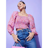 Multicolor polyester floral long-sleeve top on model, square neck, hip length