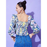 Multicolor polyester floral long-sleeve top for women with square neckline, displayed on hanger