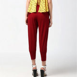 Maroon polyester elasticated trousers for women - solid pattern, ankle length, elastic closure