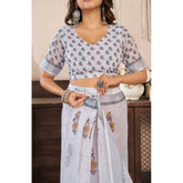 Off-white faux linen floral print ready-to-wear saree with unstitched blouse, vibrant blooms on flowing fabric