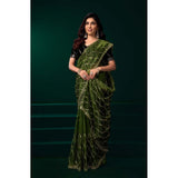 Light green net sequence saree with unstitched blouse, intricate pattern on display rack
