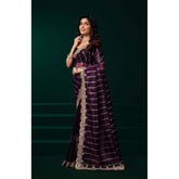 Women's wine-colored net sequence saree with unstitched blouse, intricate pattern details on display