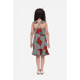 Red polyester crepe floral shoulder straps dress for girls, vibrant floral pattern on a versatile knee-length style