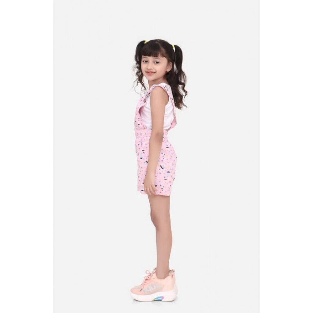 Light pink cotton printed sleeveless dungaree for girls - casual summer outfit on model