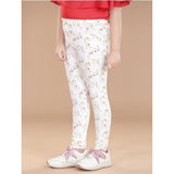 White-green cotton lycra floral elasticated jeggings for girls, casual wear with floral pattern