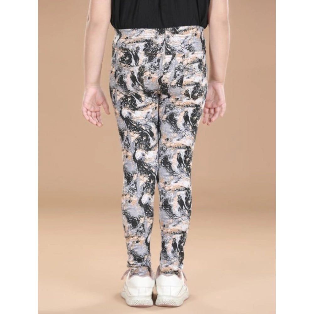 Multicolor girls' cotton lycra floral elasticated jeggings, comfortable and stylish fitness wear with a vibrant floral pattern