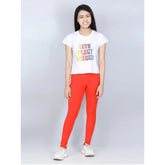 Orange cotton lycra elasticated jeggings for girls, solid pattern