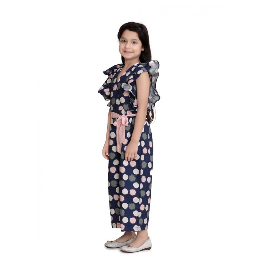 Multicolor rayon polka flutter jumpsuit for girls, playful V-neck style on model