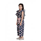 Multicolor rayon polka flutter jumpsuit for girls, playful V-neck style on model