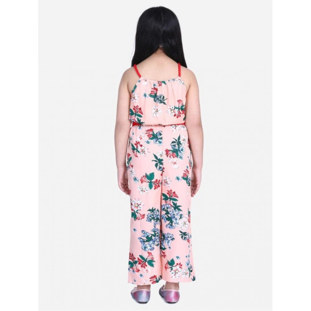 Peach-red girls' polyester crepe floral shoulder straps jumpsuit, vibrant floral pattern on display