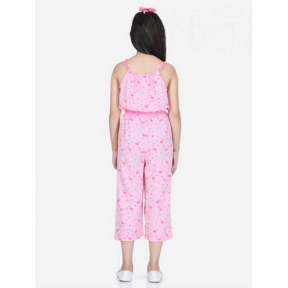 Pink rayon flamingo print sleeveless jumpsuit for girls, vibrant tropical style clothing on model
