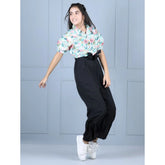 Green-Black polyester floral short sleeves jumpsuit for girls, ideal for playful occasions