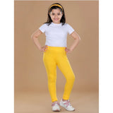 Yellow cotton lycra elasticated leggings for girls, solid design with comfort fit