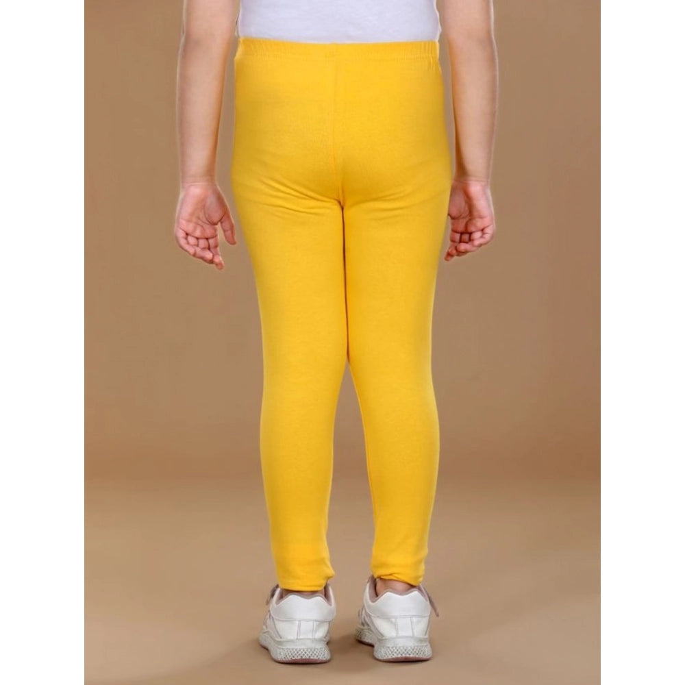 Yellow cotton lycra leggings for girls, elasticated for comfort and versatile wear