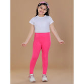 Pink cotton lycra elasticated leggings for girls, solid pattern, perfect for activewear