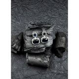Blue brass silver-plated drop earrings for women, delicate jewelry accessory on display