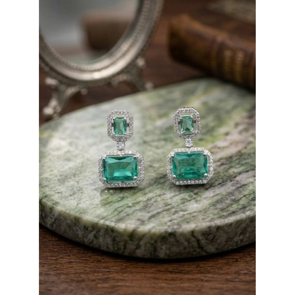 Green brass silver plated drop earrings for women, jewelry accessory on display stand