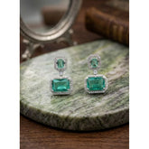 Green brass silver plated drop earrings for women, jewelry accessory on display stand