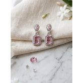 Women's pink brass silver plated drop earrings, jewelry accessory on white background
