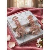 Women's pink brass silver plated drop earrings, delicate jewelry accessory on display