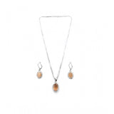 Orange brass silver-plated pendant set for women, elegant jewelry accessory on display