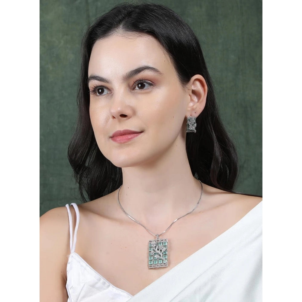 Turquoise brass silver plated pendant set for women, elegant jewelry accessory on display