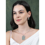 Turquoise brass silver plated pendant set for women, elegant jewelry accessory on display