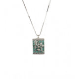 Turquoise brass silver-plated pendant set for women, jewelry accessory on display