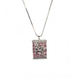 Pink brass silver plated pendant set for women, jewelry accessory on display
