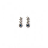 Blue brass silver plated women's necklace set on velvet display, care for jewellery by keeping it dry