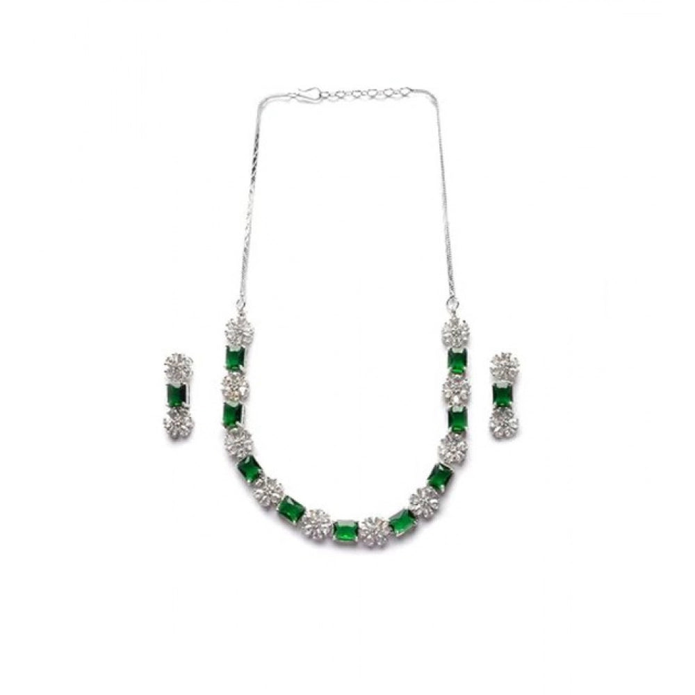 Green brass silver plated necklace set for women, delicate jewelry on display stand