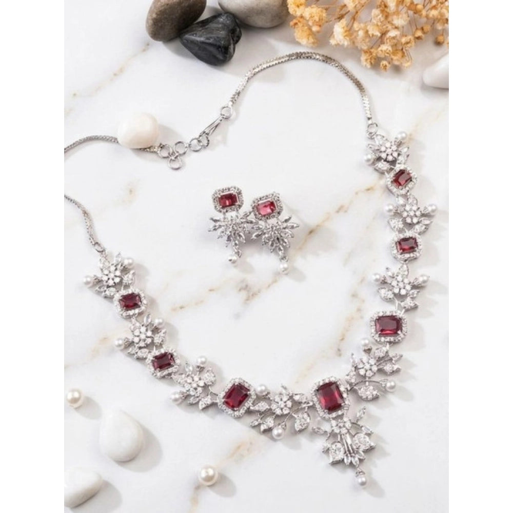 Red brass silver plated necklace set for women, elegant jewelry accessory on display stand