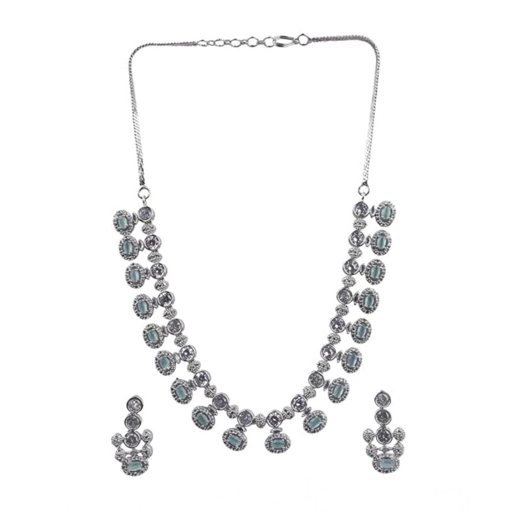 Turquoise brass silver plated necklace set for women, elegant jewelry on display