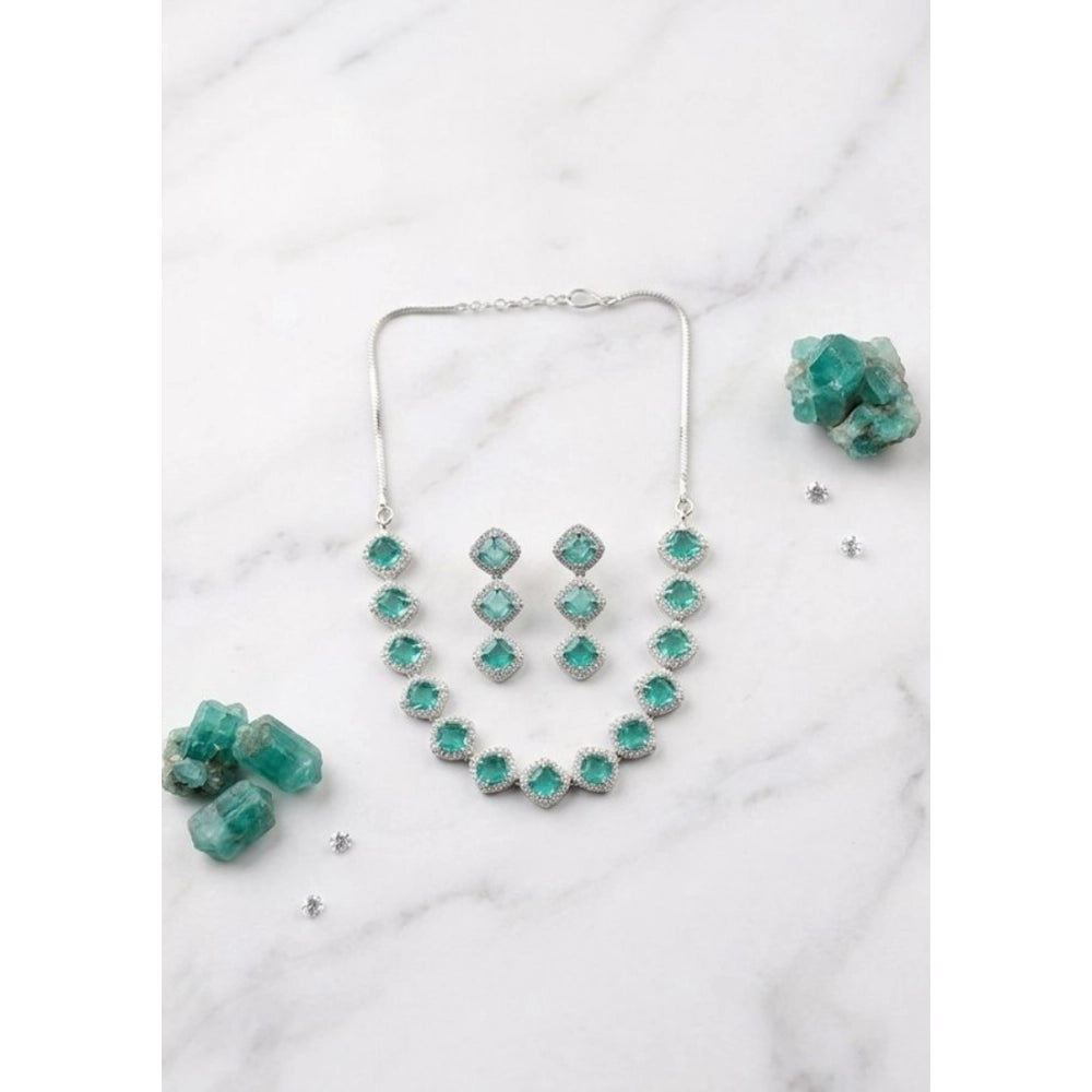 Green brass silver-plated women's necklace set, elegant jewelry accessory on display