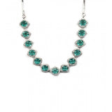 Green brass silver plated necklace set for women, elegant accessory on display stand