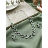 Green brass silver-plated women's necklace set, elegant jewelry accessory on display