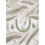 Green brass silver-plated women's necklace set on display, ideal for accessorizing formal wear