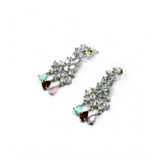 Multicolor brass silver plated necklace set for women, ornate jewelry on display stand