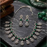 Green brass silver plated necklace set for women, elegant jewelry set on display