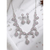 Pink brass silver-plated necklace set for women, delicate jewelry on display
