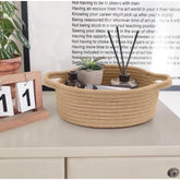 Beige cotton round bedside organizer (8x3 inches), multi-purpose storage solution for bathroom, living room, kitchen, kids toys, or clothes