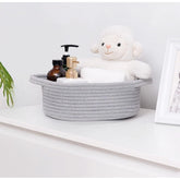 Gray cotton round bedside organizer without lid, multi-purpose storage solution for bathroom, living room, kitchen, or kids toys