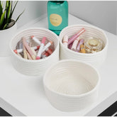 White cotton 3-piece round bedside organizer without lid, perfect for bathroom, living room, or kitchen use as a multi-purpose organizer for toys, clothes, or storage baskets